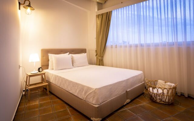 Guzi Rooms & Suites