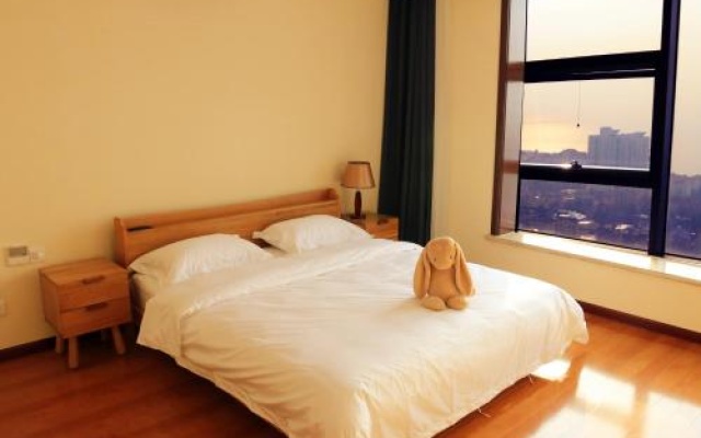 Lidu Hotel Apartment with Sea View (Wusi Square Xianggang Middle Road Shop) – Guest Rooms – Qingdao