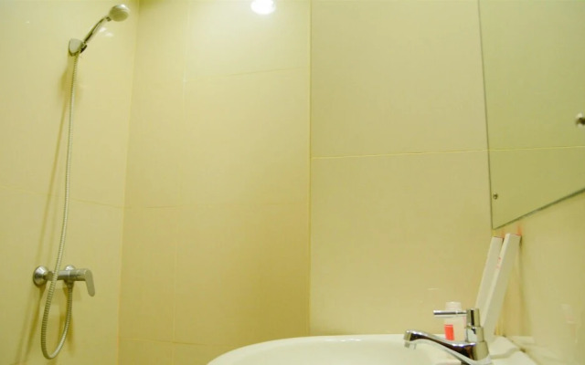 Simply Studio Room Atria Residence Apartment near Summarecon Mall By Travelio