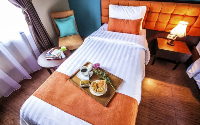 Capital O 1662 Ole Suites Hotel