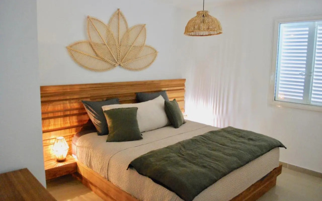Le Baileys - Spacieux appartement en rez-de-jardin vue lagon
