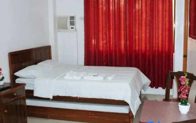 RedDoorz @ LS Suites Poblacion Culasi Antique