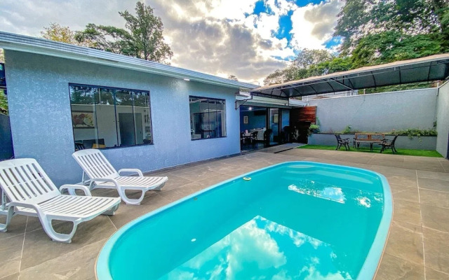 Casa Central piscina e AC para 8 hospede