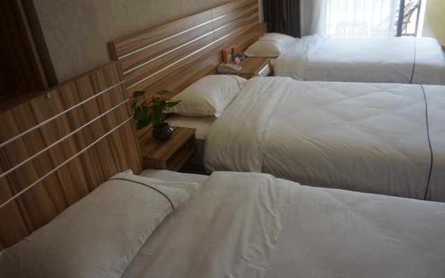 Xishuangbanna Shibao Business Hotel – Guest Rooms – Xishuangbanna