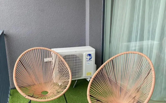 E&K apartamentai su šildomu baseinu kieme