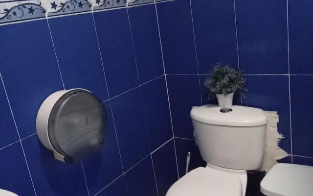 Room in Guest Room - Green Sea Inn in the San Luis Sector