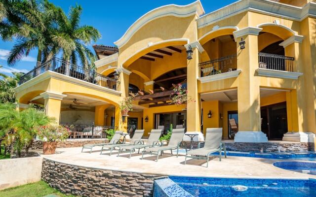 Mediterranean-style Flamingo Mansion Offers the Ultimate in Beachfront Luxury