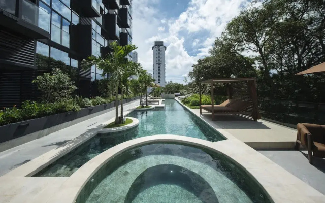 4 Guests 1 Bedroom Shared Pool