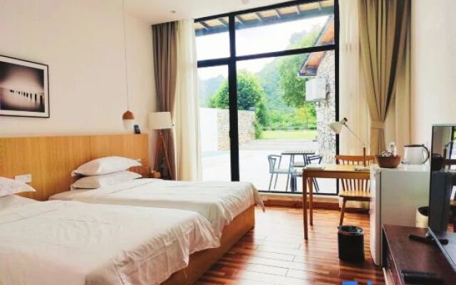 Xingyi Wanfeng Linyi Boutique Inn (Wanfenglin Baguatian Attractions)