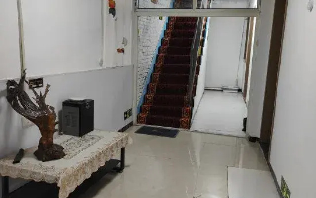 Luoyang Qingqing Yuanshe Homestay (Lijingmen Cross Street Store)