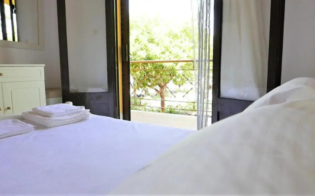 Amarynthos Beachfront Vacation House with garden
