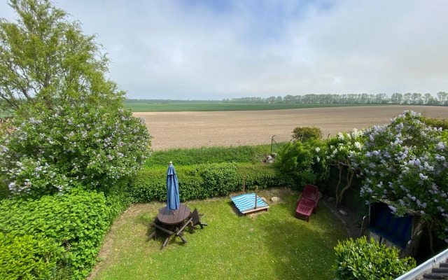 Ferienwohnung im Poolhaus mit Ostseeblick