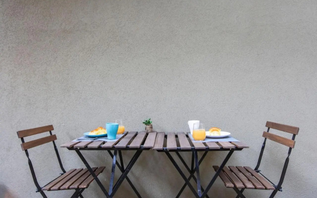 Downtown Studio w/ AC & Patio by LovelyStay