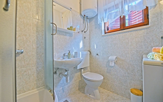 Holiday house Viki - sea view terrace: Postira, Island Brac