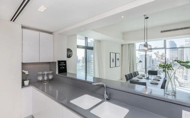 FAM Living - Mada Residences Downtown