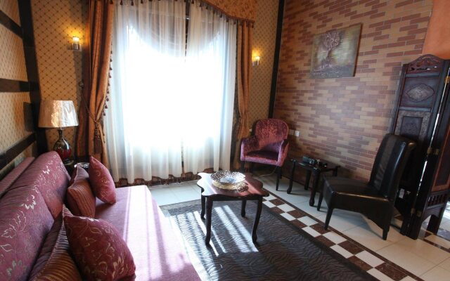 Roomi Suites Hotel