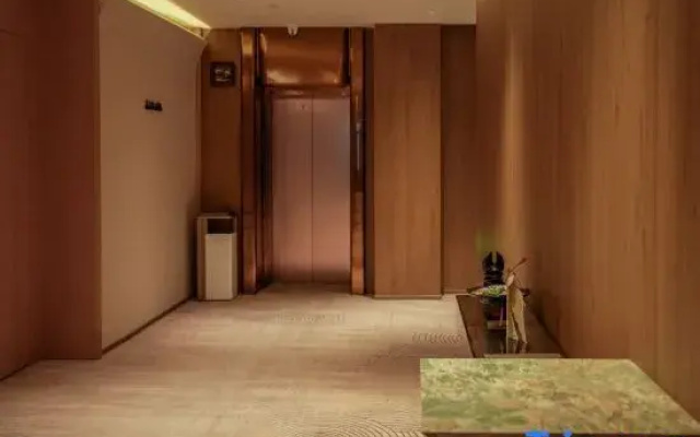 Lansheng Hotel (Xing Yi Jushan Square Mengle City Branch)