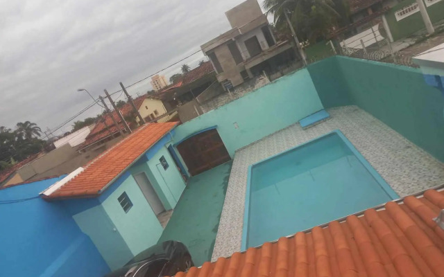 CASA DE PRAIA CARAGUA COM Piscina
