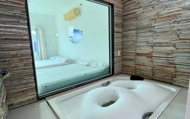 casa de praia com piscina e hidromassagem