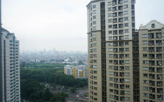 Homey and Warm 2BR Mediterania Palace Apartment