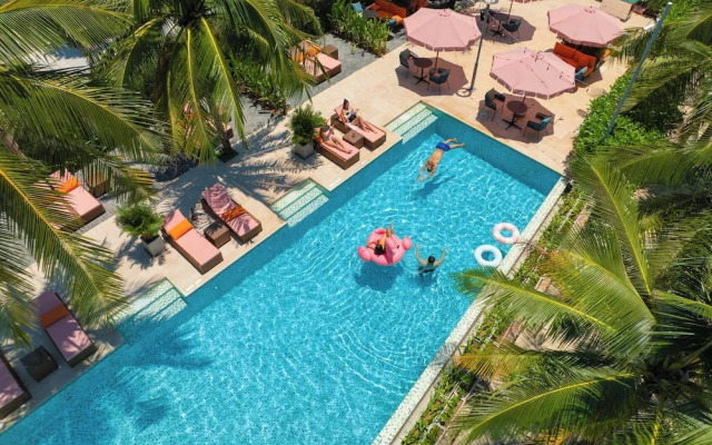Signature By M Village Beachfront Hotel