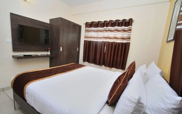 Home Apartment The Premium Services by OYO Rooms