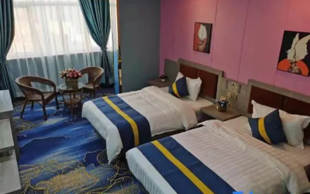 Xinmeijia Business Hotel (Huatian Town)