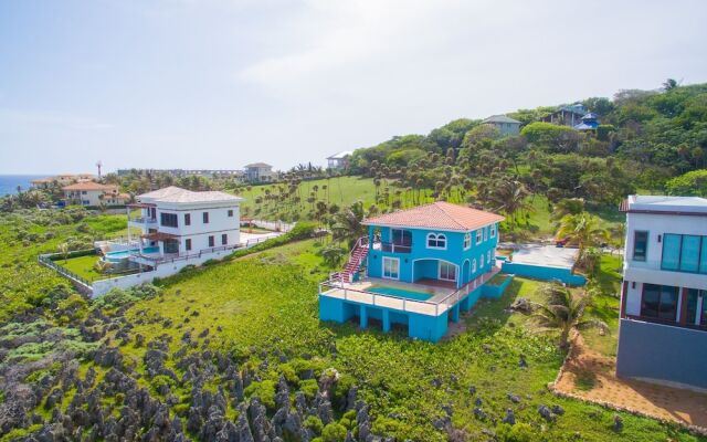 Stunning Coral View Home with Oceanfront Pool by RedAwning