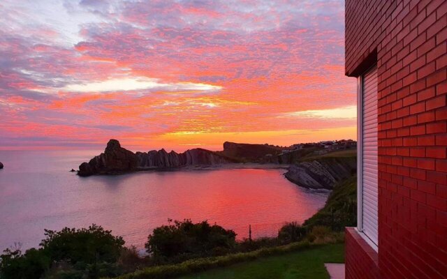 House with 5 bedrooms in Cantabria with wonderful sea view enclosed garden and WiFi 50 m from the beach