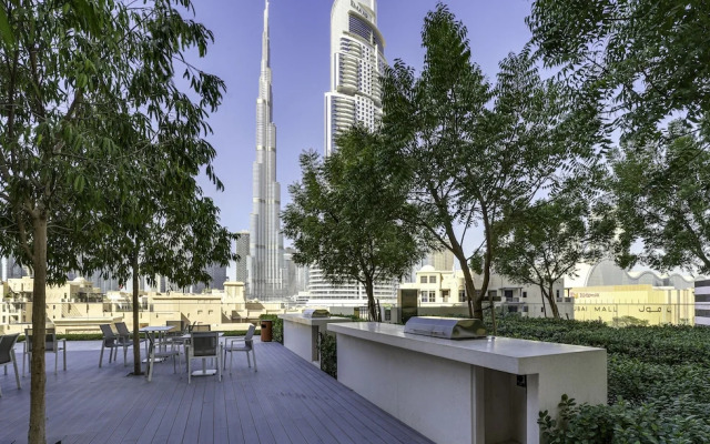 Sleek 1BR in Burj Royale with Canal View
