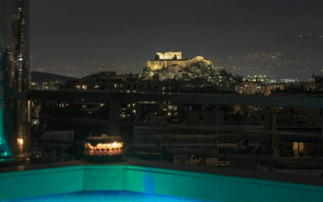 Pristine penthouse with Parthenon view by the pool