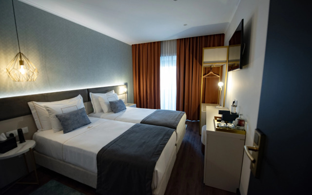 Duplo Charme Boutique Hotel