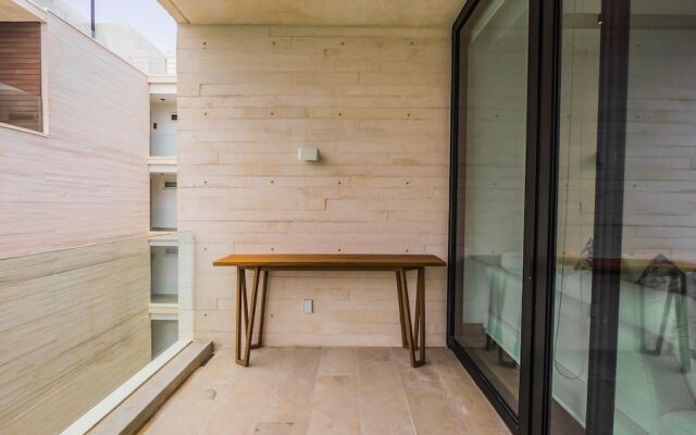 Contemporary Design Oceana 422 Playa del Carmen Condo by RedAwning