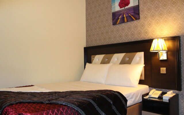 OYO 902 Prime Hotel Llc