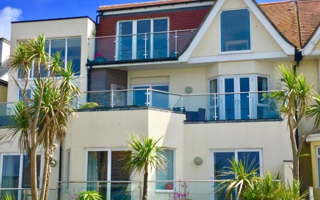 SEA BEACH & COASTAL VIEWS from LRG SUN TERRACE G Bay Apartments OVERLOOKS FISTRAL BEACH MOST DESIRABLE LOCATION SLEEPS & DINES 6 which includes SOFABED 2 BATHROOMS AL FRESCO Dining Smart tv all rooms PRIVATE PARKING 2 CARS sat-sat only April-Nov please