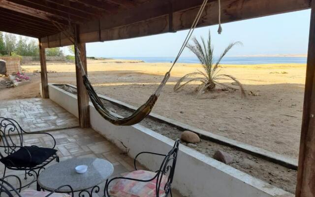 Beach apartment in front of the sea