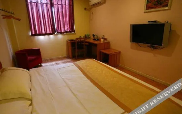 Zitong Aijia Business Hotel