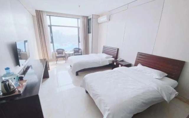 Huanle Business Hotel