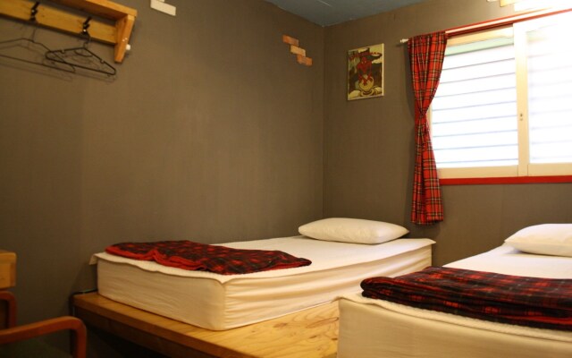 Mr.Comma Guesthouse - Hostel