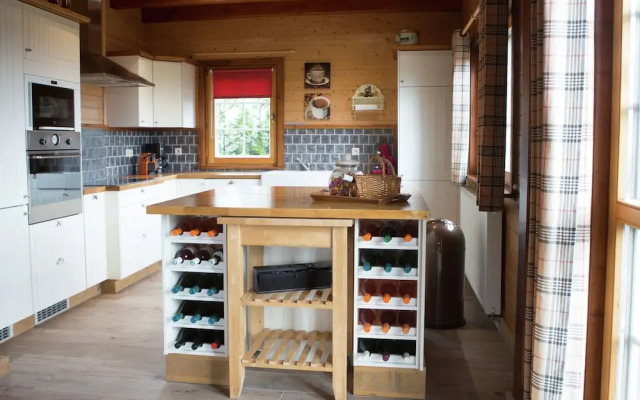 Affluent Chalet in Septon with Whirlpool, Sauna, Hot Tub