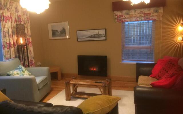 Secluded ground floor village centre apartment