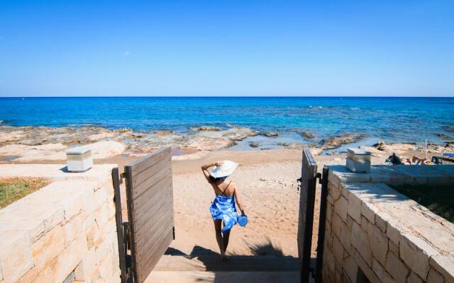 Beachfront Villa Diamond with a heated pool