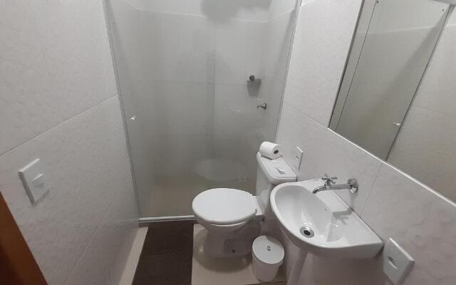 Suite climatizada, ao lado da praca principal