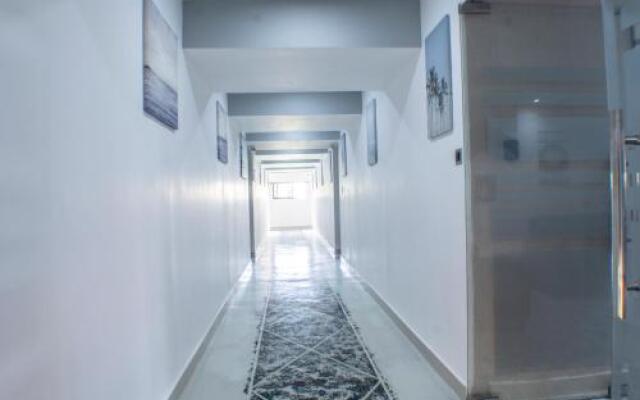 Malecon Rooms y Hotel