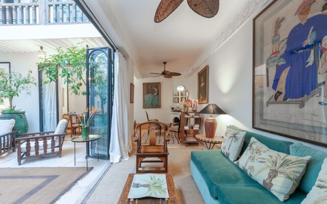 Riad Le J