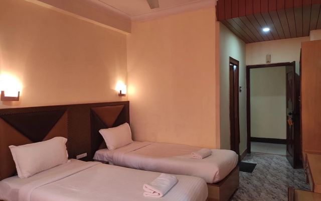 Ambarish Grand Residency – Guest Rooms – Guwahati