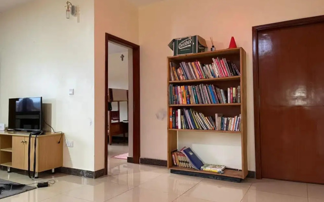 The Mugabi's Spacious Private Room