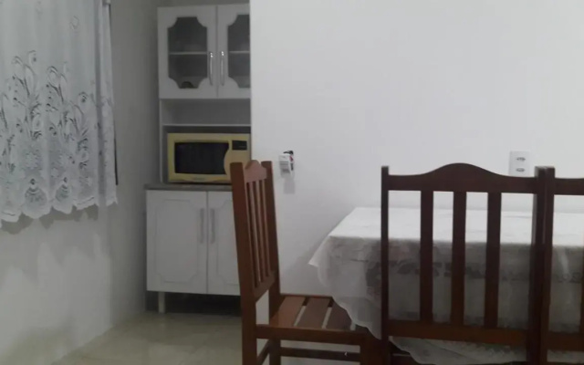 Casa 01 Dorm Terreno Compartido