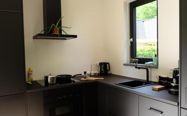 The Black Oak - Luxe bungalow met prive sauna
