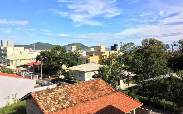 Ambiente Descolado 100m da praia e piscina